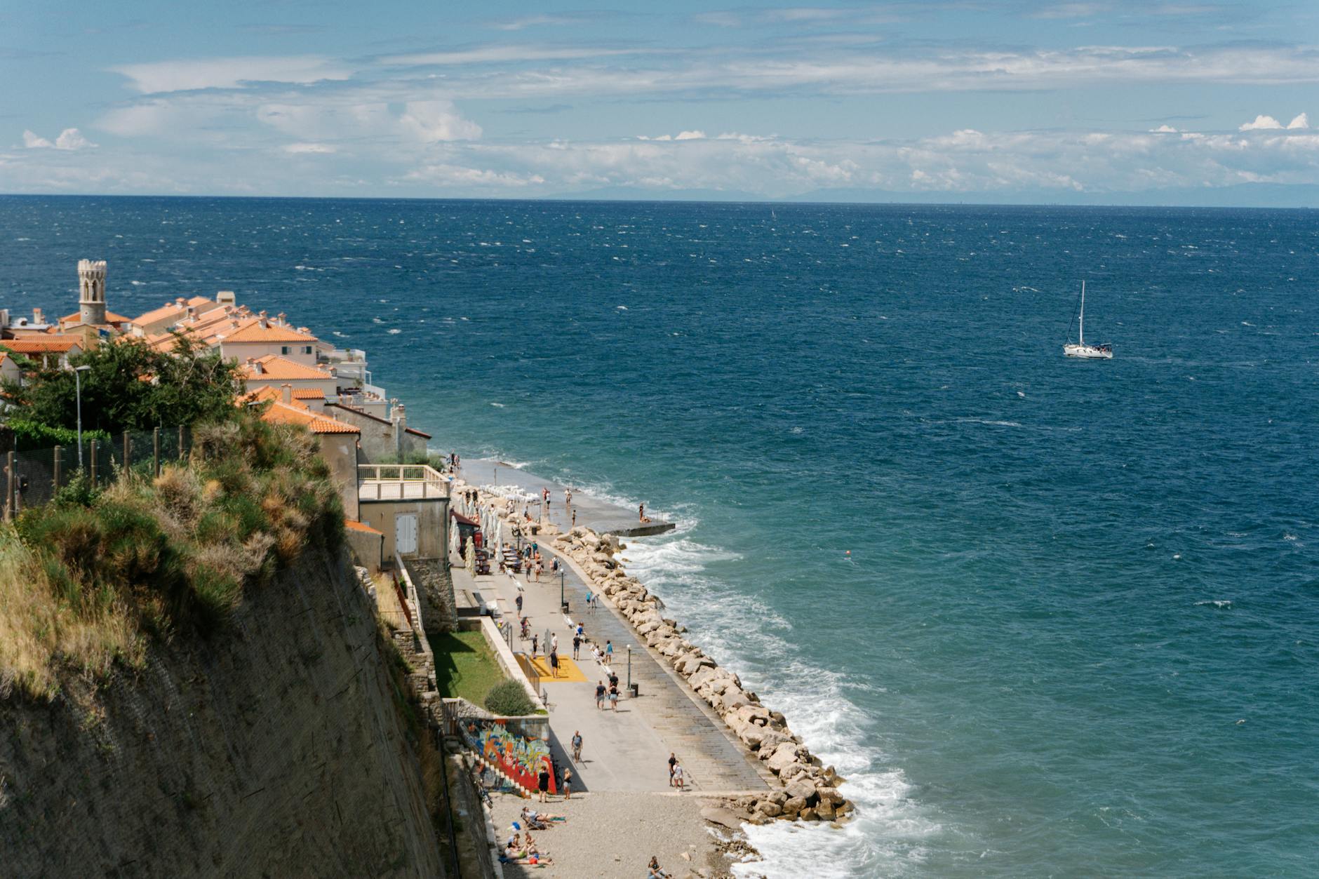 scenic view of the beach of piran Slovenia coastline with blue sea